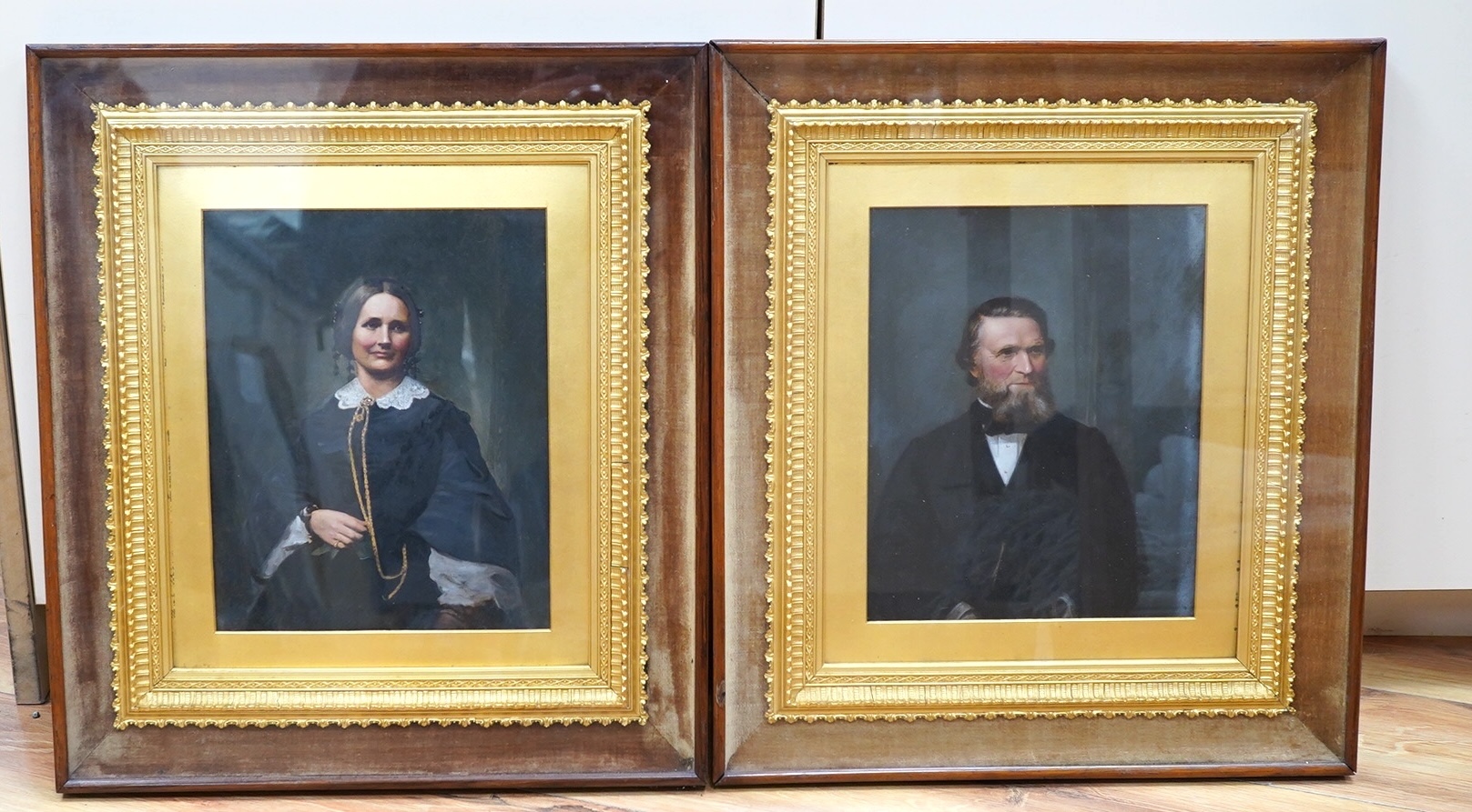 Mid Victorian, a pair of overpainted photograph portraits of Thomas and Elizabeth Simson, housed in ornate gilt frames, 25x20cm. Condition - good